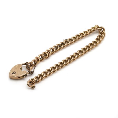 Lot 497 - A gold curb link bracelet