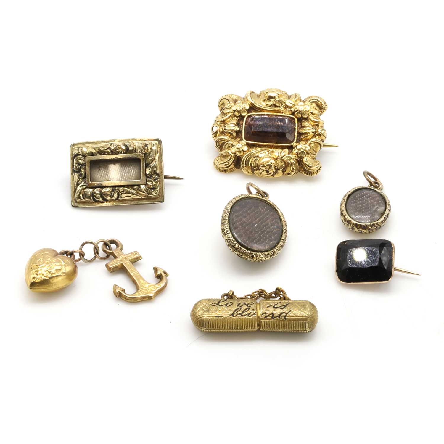 Lot 372 - A group of 19th century gold brooches and charms