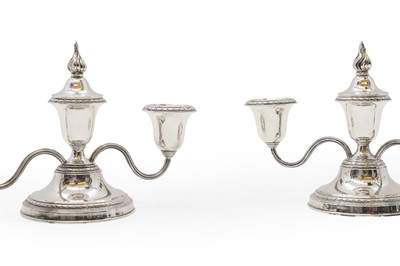 Lot 38 - A pair of silver dwarf candelabra