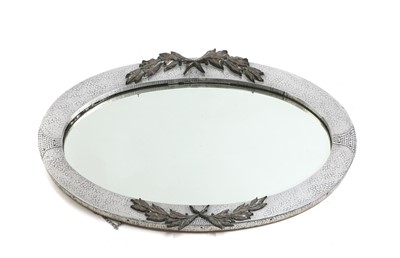 Lot 519 - An Arts and Crafts planished pewter wall mirror