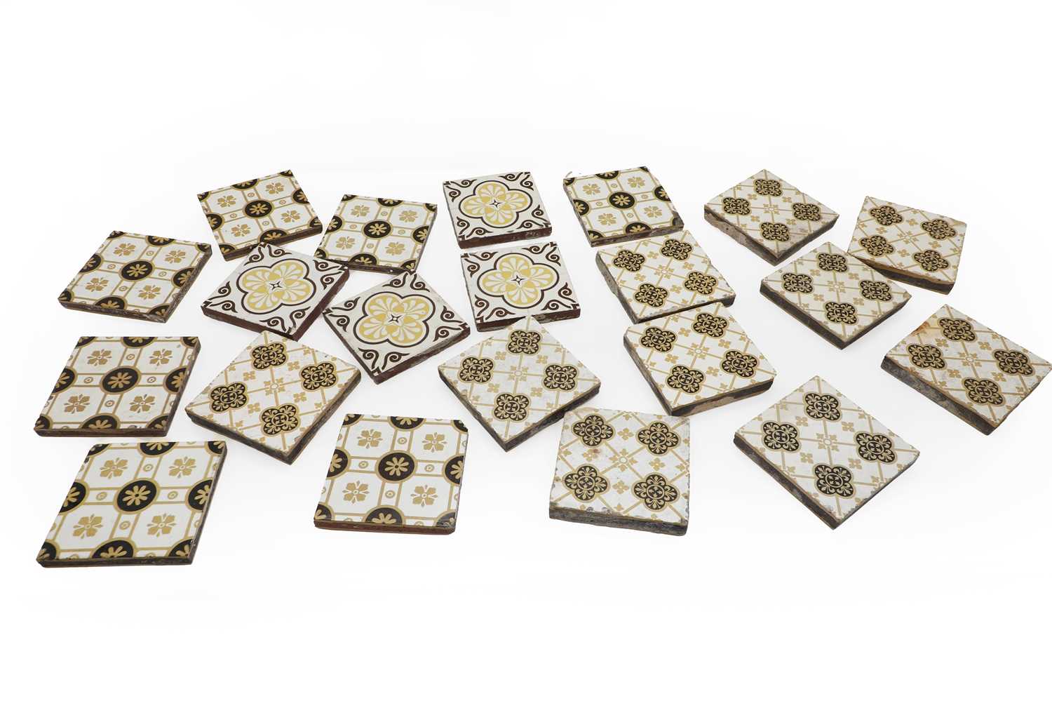 Lot 114 - A collection of encaustic tiles,