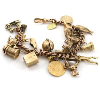 Lot 487 - A 9ct gold charm bracelet
