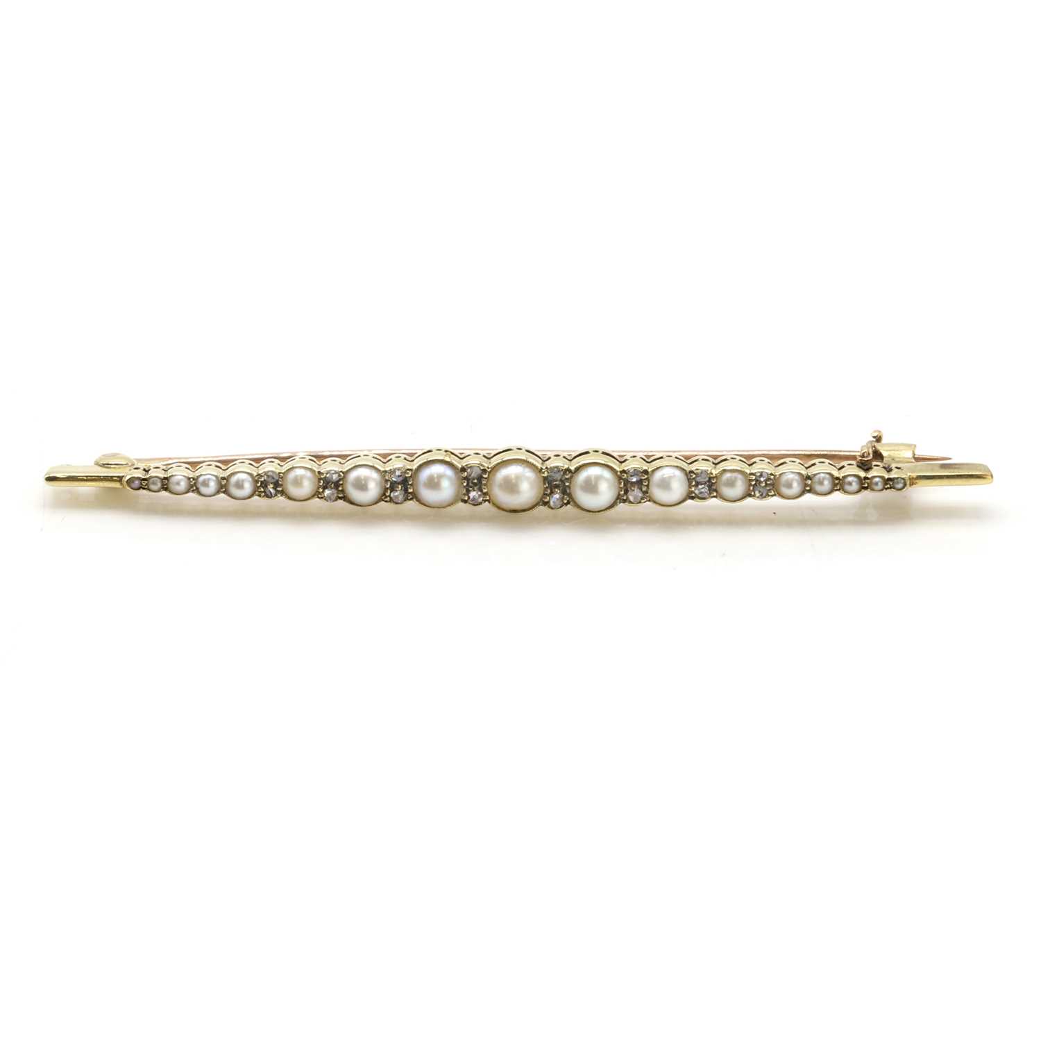 Lot 23 - An early 20th century pearl and diamond bar brooch