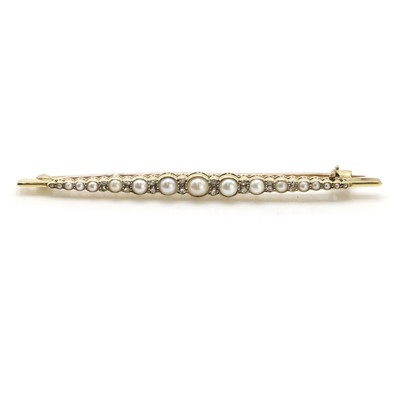 Lot 53 - An early 20th century pearl and diamond bar brooch