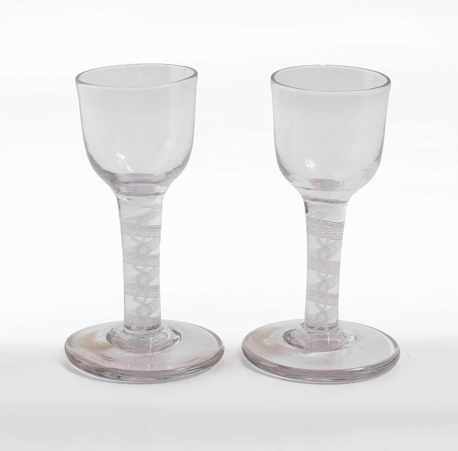 Lot 15 - A pair of opaque-twist wine glasses