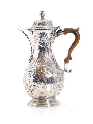 Lot 22 - A George II silver hot water jug