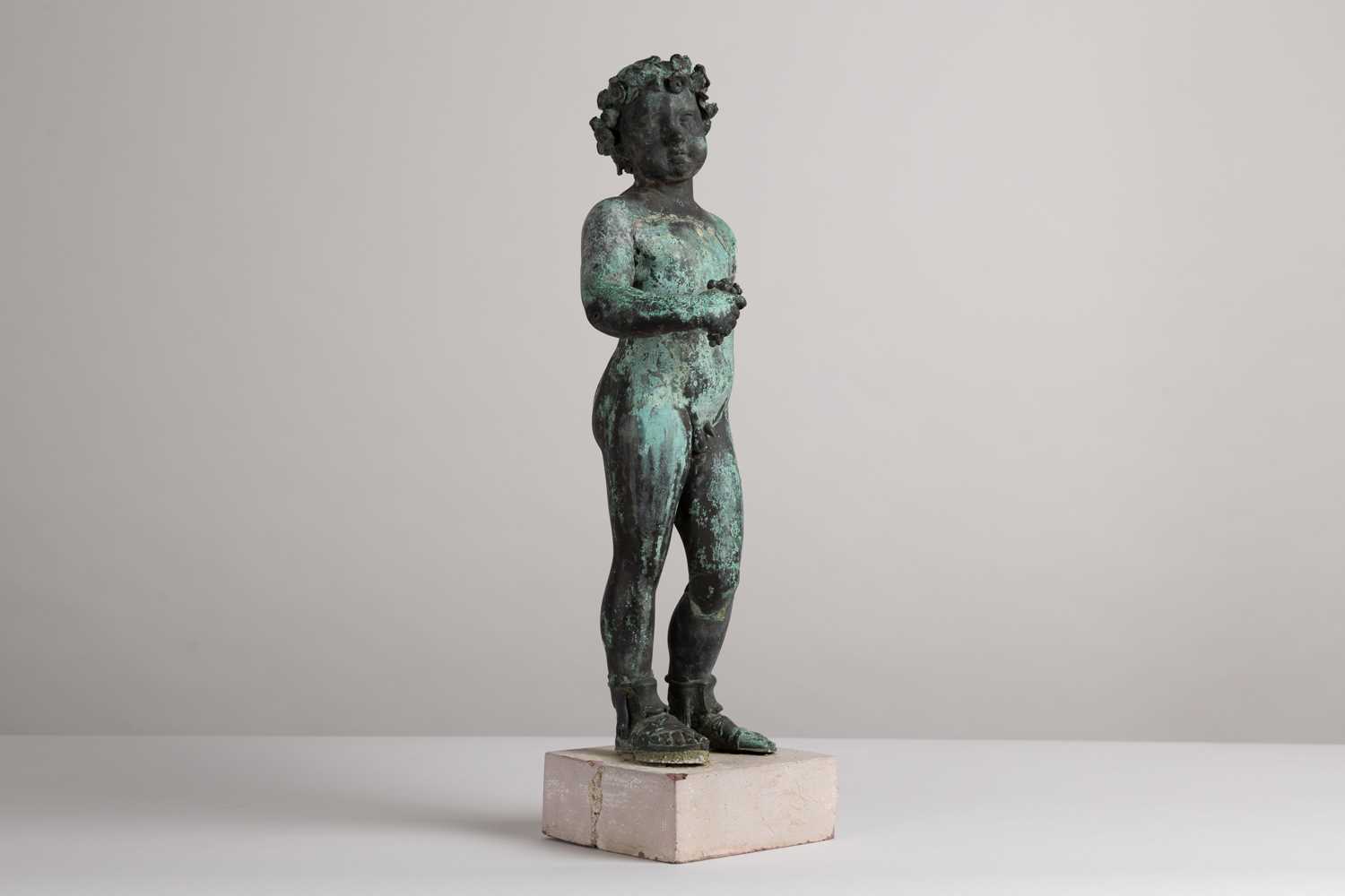Lot 148 - A bronze putto