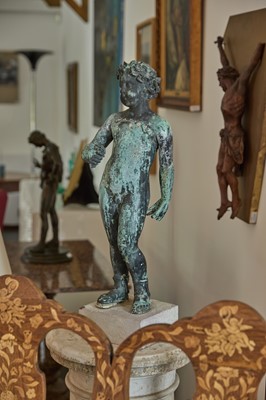 Lot 148 - A bronze putto