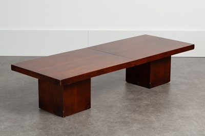 Lot 81 - An walnut extending coffee table