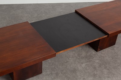 Lot 81 - An walnut extending coffee table