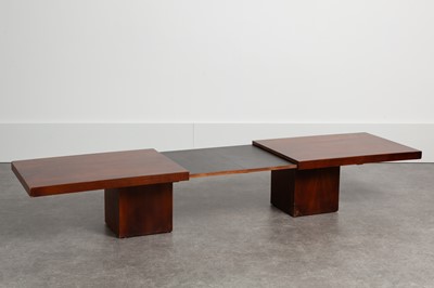 Lot 81 - An walnut extending coffee table