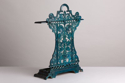 Lot 28 - A patinated cast iron stick stand