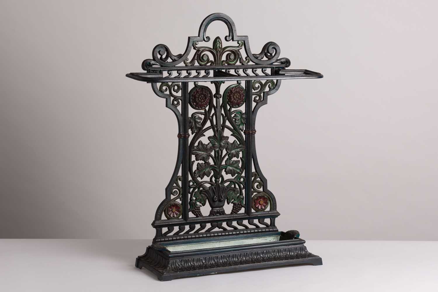 Lot 28 - A patinated cast iron stick stand