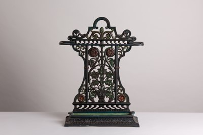 Lot 28 - A patinated cast iron stick stand