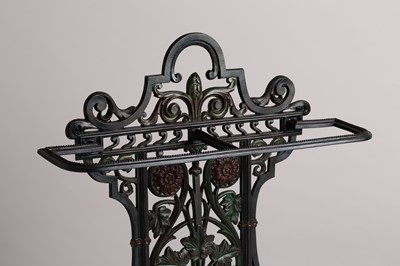 Lot 28 - A patinated cast iron stick stand