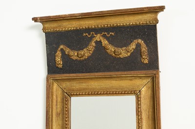 Lot 132 - A carved and gilt wall mirror