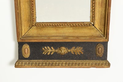 Lot 132 - A carved and gilt wall mirror