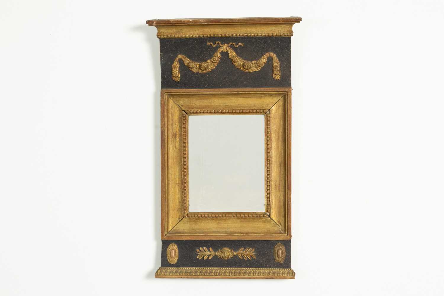 Lot 132 - A carved and gilt wall mirror