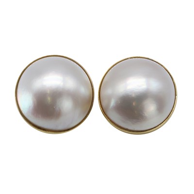 Lot 192 - A pair of 18ct gold Mabe pearl set earrings