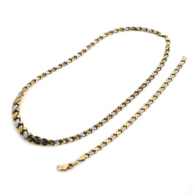 Lot 295 - A 9ct two colour gold necklace and bracelet set