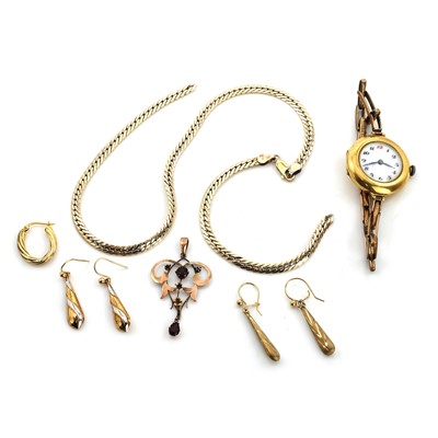 Lot 398 - An 18ct gold mechanical watch and a group of gold and silver gilt jewellery