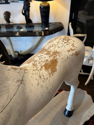 Lot 74 - A carved and painted model of a horse
