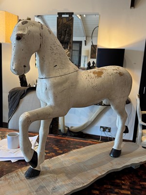 Lot 74 - A carved and painted model of a horse