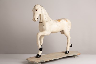 Lot 74 - A carved and painted model of a horse