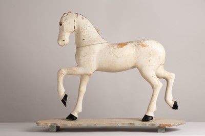 Lot 74 - A carved and painted model of a horse