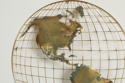 Lot 79 - A pair of brass and fret-cut wall-mounted 'world' sculptures