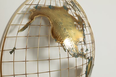 Lot 79 - A pair of brass and fret-cut wall-mounted 'world' sculptures