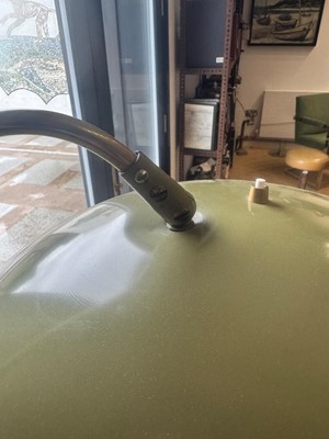 Lot 64 - A brass and green-lacquered standard lamp