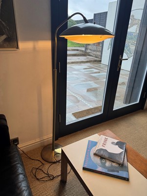 Lot 64 - A brass and green-lacquered standard lamp