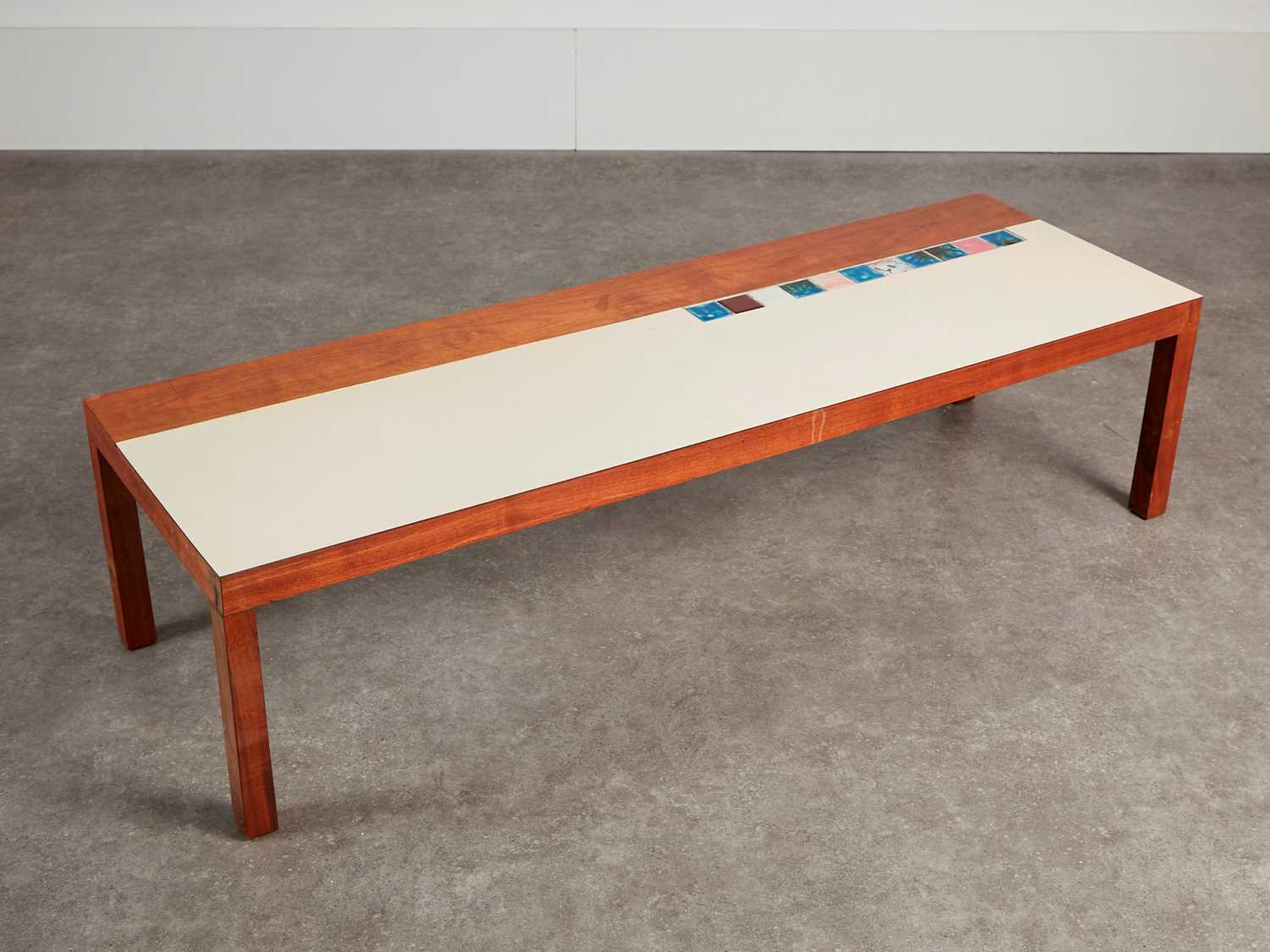 Lot 90 - A walnut, Formica and tile-top coffee table