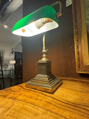 Lot 195 - A pair of brass and cased-glass desk lamps