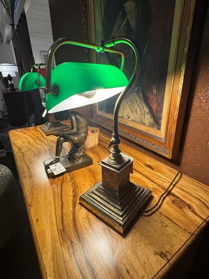 Lot 195 - A pair of brass and cased-glass desk lamps