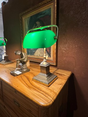 Lot 195 - A pair of brass and cased-glass desk lamps