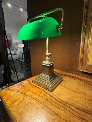 Lot 195 - A pair of brass and cased-glass desk lamps