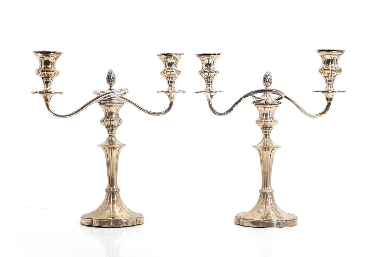 Lot 35 - A pair of silver candelabra