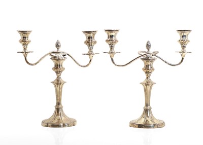 Lot 35 - A pair of silver candelabra