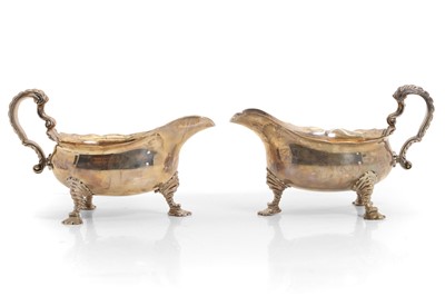 Lot 33 - A pair of George II style silver sauceboats