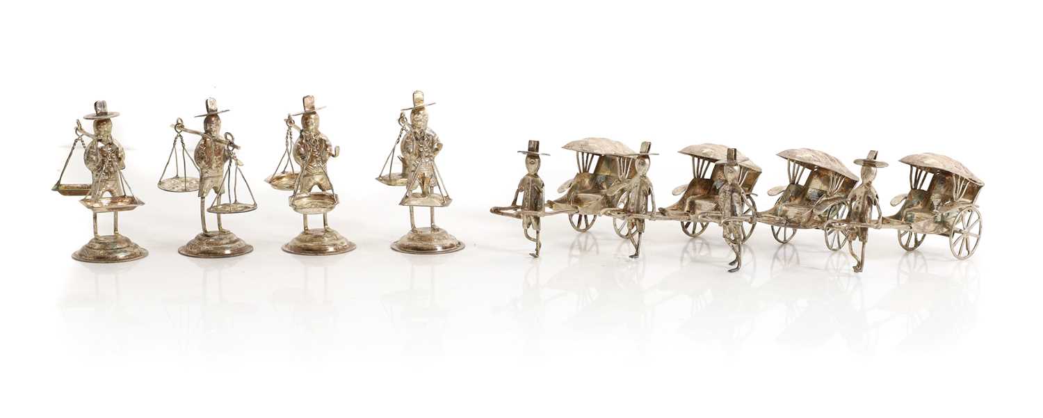 Lot 25 - A group of eight Chinese silver figures