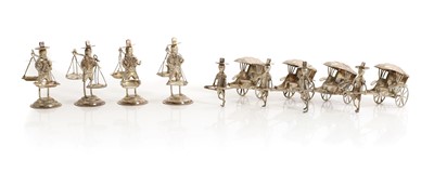 Lot 25 - A group of eight Chinese silver figures