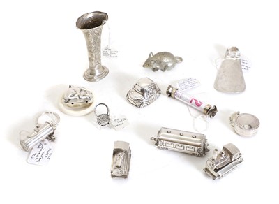 Lot 59 - A silver rabbit form teething ring with a white celluloid ring