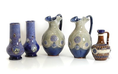 Lot 241 - A pair of Royal Doulton stoneware ewers