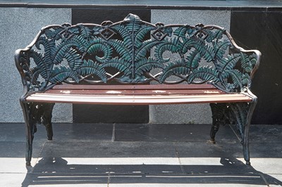 Lot 449 - A cast iron bench