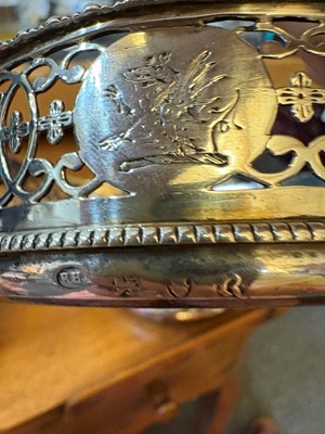 Lot 42 - A set of four George III silver wine coasters