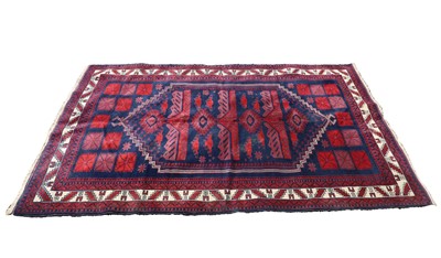 Lot 467 - A Baluch wool rug