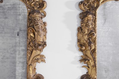 Lot 121 - A pair of George II giltwood pier mirrors attributed to Matthias Lock