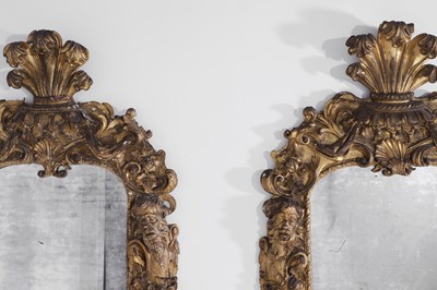 Lot 121 - A pair of George II giltwood pier mirrors attributed to Matthias Lock